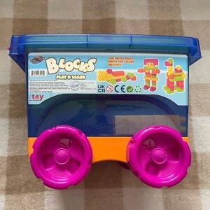 Lollipop 62 Piece Block Set with Toy Block Storage Box with Pink Wheels